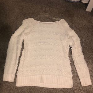 White sweater with detailed stripes